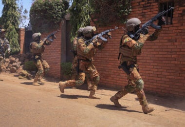 Malian soldiers, assigned to Battalion Autonomes des Forces Speciales tacticaly conduct close combat battle drills in Ouagadougou, Burkina Faso on Feb. 26, 2019. The close quarters battle training events like these are part of the Flintlock 2019 exercise scenarios. (U.S Army photo by Spc. Peter Seidler)