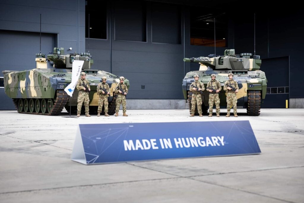 A "Made In Hungary" sign in front of two KF41 Lynxes at the rollout ceremony of the first Lynx assembled in Hungary, July 24 2024 (Hungarian Defense Ministry)