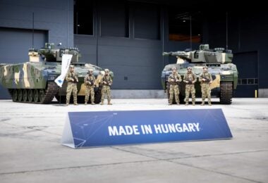 A "Made In Hungary" sign in front of two KF41 Lynxes at the rollout ceremony of the first Lynx assembled in Hungary, July 24 2024 (Hungarian Defense Ministry)