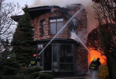 Ukrainian firefighters work to extinguish a fire at a house caused by a Russian missile attack on the city of Dnipro on 21 November (State Emergency Service of Ukraine)