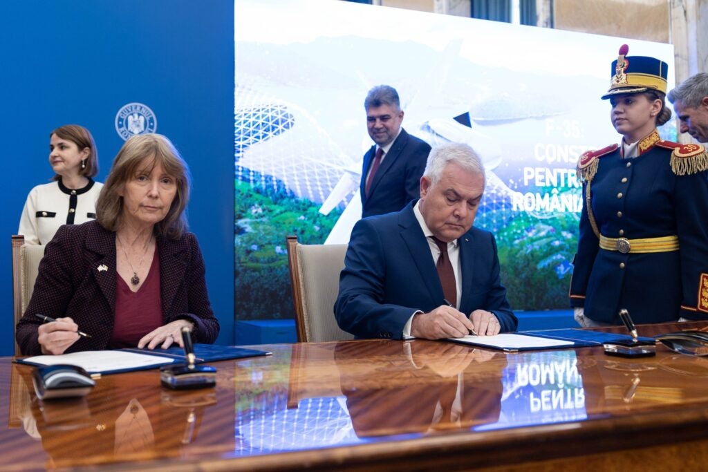 United States Ambassador to Romania Kathleen Kavalec and Romanian Defence Minister Angel Tîlvăr at the signing of the letter of offer and acceptance (Romanian Ministry of National Defence)