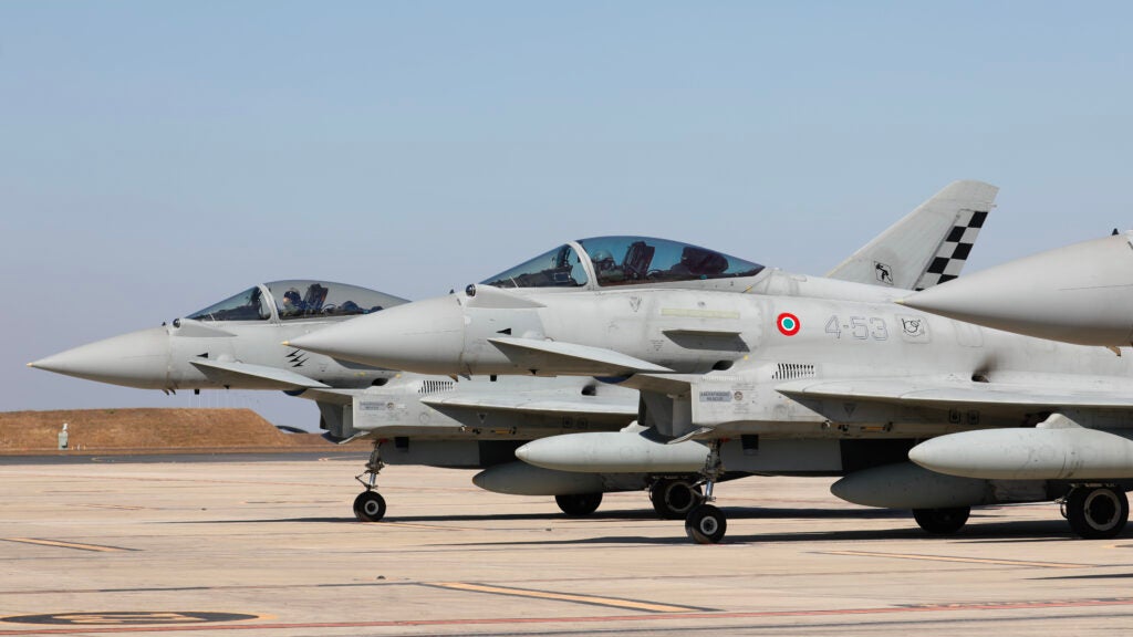 Italian Air Force Eurofighter Typhoons hold on the flightline at RAAF Base Darwin following their arrival for Exercise Pitch Black 24. *** Local Caption *** Exercise Pitch Black 24 is the Royal Australian Air Forces biennial capstone international engagement exercise, with forces drawn from a wide range of regional, coalition, and allied nations. Held from 12 July to 2 August 2024, the exercise is concentrated on military airspace in the Northern Territory, with participants flying from RAAF Bases Darwin, Tindal, Amberley, Curtin, and regional airfields in the Kimberley region. Exercise Pitch Black 24 is the largest iteration of the exercise since first held in 1981, with 20 nations and over 140 aircraft involved, and approximately 4600 personnel from Australia and overseas participating. Activities such as Exercise Pitch Black help Australia to advance a free and open Indo-Pacific region, build connections around the globe, bolster regional security, and build regional resilience to transnational threats.