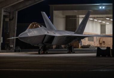 A U.S. Air Force F-22A Raptor assigned to the 525th Expeditionary Fighter Squadron sits parked in a flow-through during a base-wide readiness exercise at Kadena Air Base, Japan, Jan. 15, 2025. The diverse array of fighters, alongside joint and allied forces strengthen operational readiness to defend Japan while ensuring a free and open Indo-Pacific through a robust presence of dynamic fighter aircraft. (U.S. Air Force photo by Airman 1st Class Catherine Daniel)