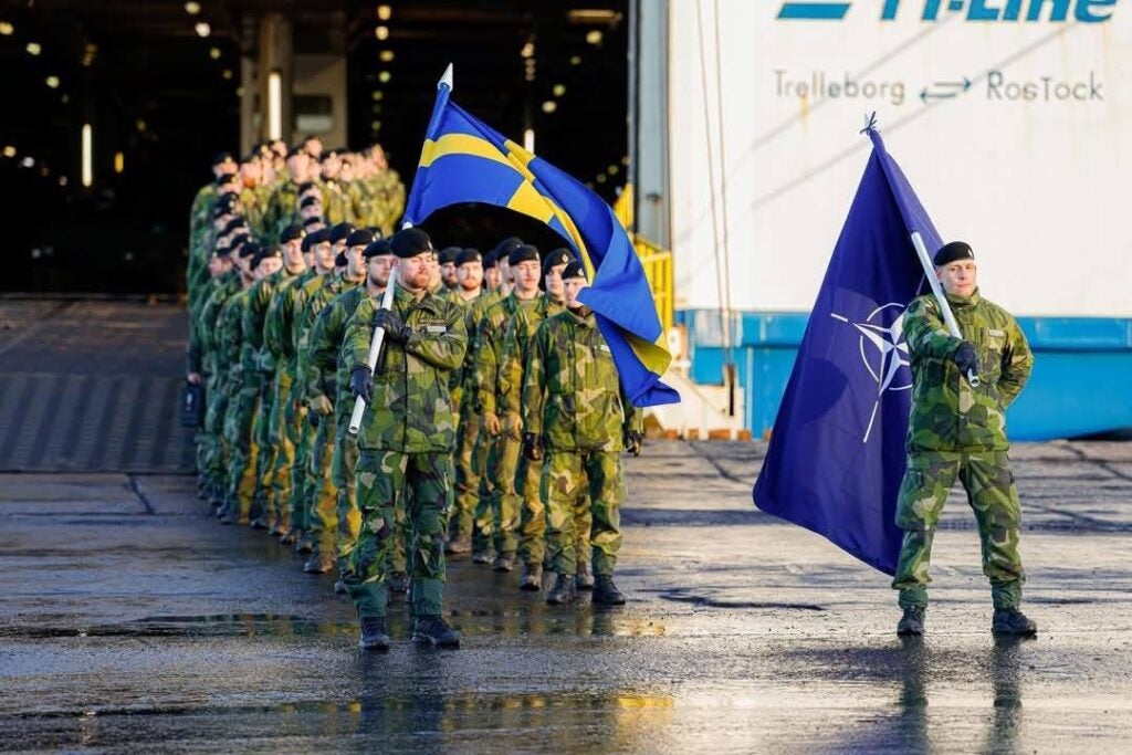 The Swedish Mechanised Infantry Battalion arrive in Latvia to join the NATO Multinational Brigade Latvia at Riga Central Terminal, Latvia, on 18 January, 2025. Photo Credit: Ministry of Defence, Republic of Latvia