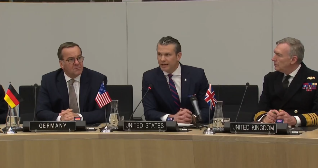 US Defense Secretary Pete Hegseth speaks at a meeting of the Ukraine Defense Contact Group in Brussels on February 12, 2025 (US Department of Defense live feed screenshot)